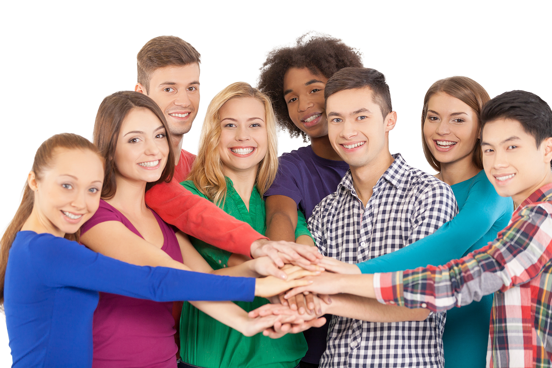 We are strong when we together. Cheerful group of multi-ethnic people holding hands together and smiling at camera while standing isolated on white