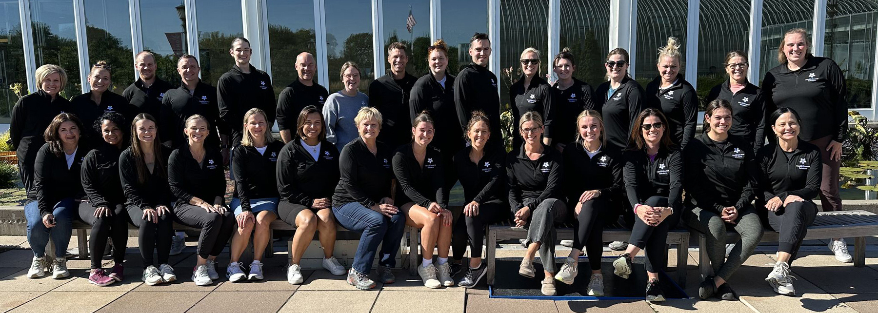 group photo of HealthSource Solutions staff for meeting at Como Zoo