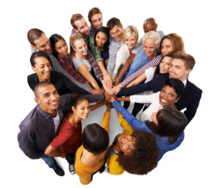 Teamwork with group of coworkers from above with hands in center touching