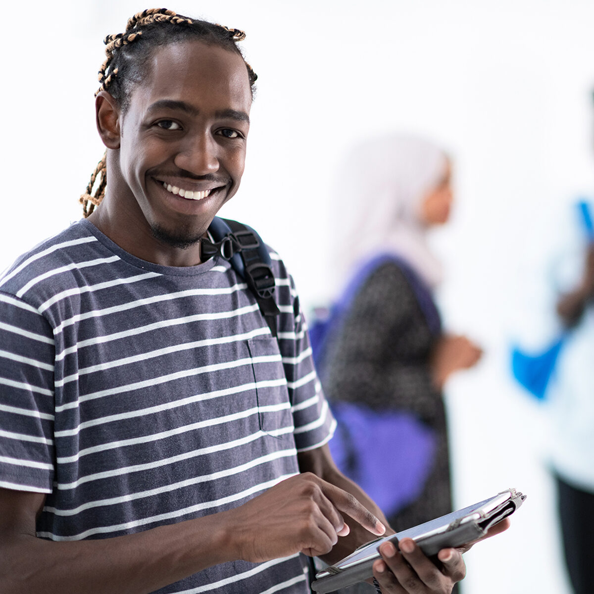 Young African American student on iPad